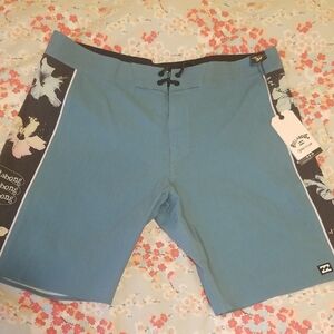 Billabong Men's Teal Board Shorts with Black Floral Side Panels